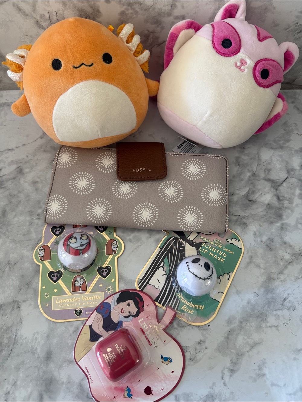 Retail $125 Bundle Fossil long wallet, 3 Disney lip mask and 2 squishmallows